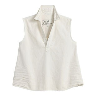 The FRANK & EILEEN Olivia Popover Henley Tank in Famous Denim Vintage White features a sleeveless, collared design with a V-neck and subtle stitched detailing near the hem, shown against a plain background.