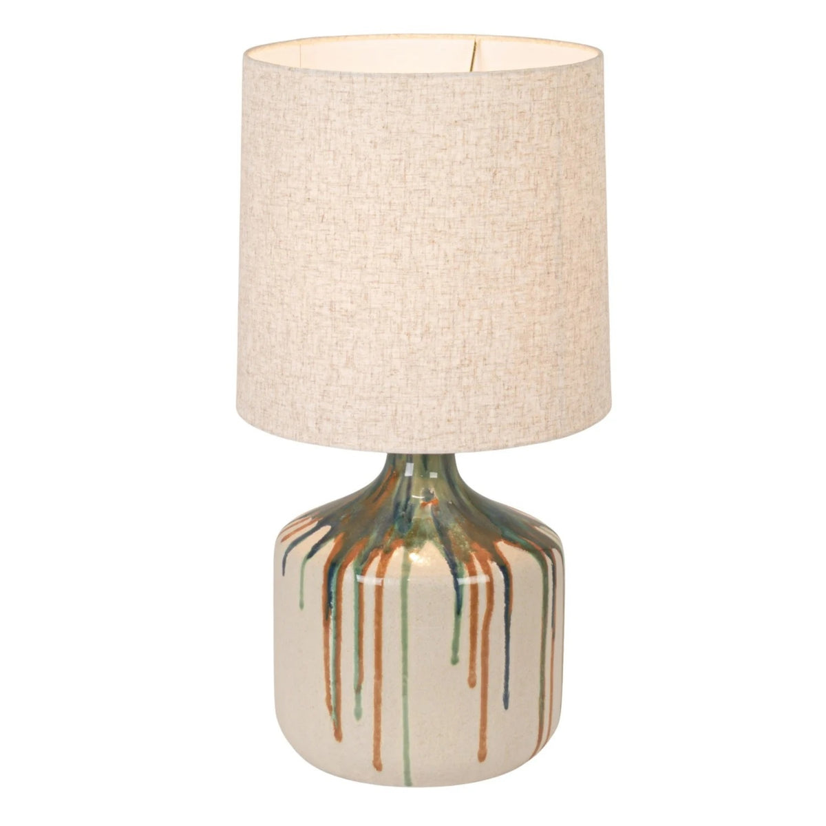 The CREATIVE COOP Stoneware Table Lamp features a textured beige linen shade and a ceramic base with artisan green and brown drip glaze over cream.