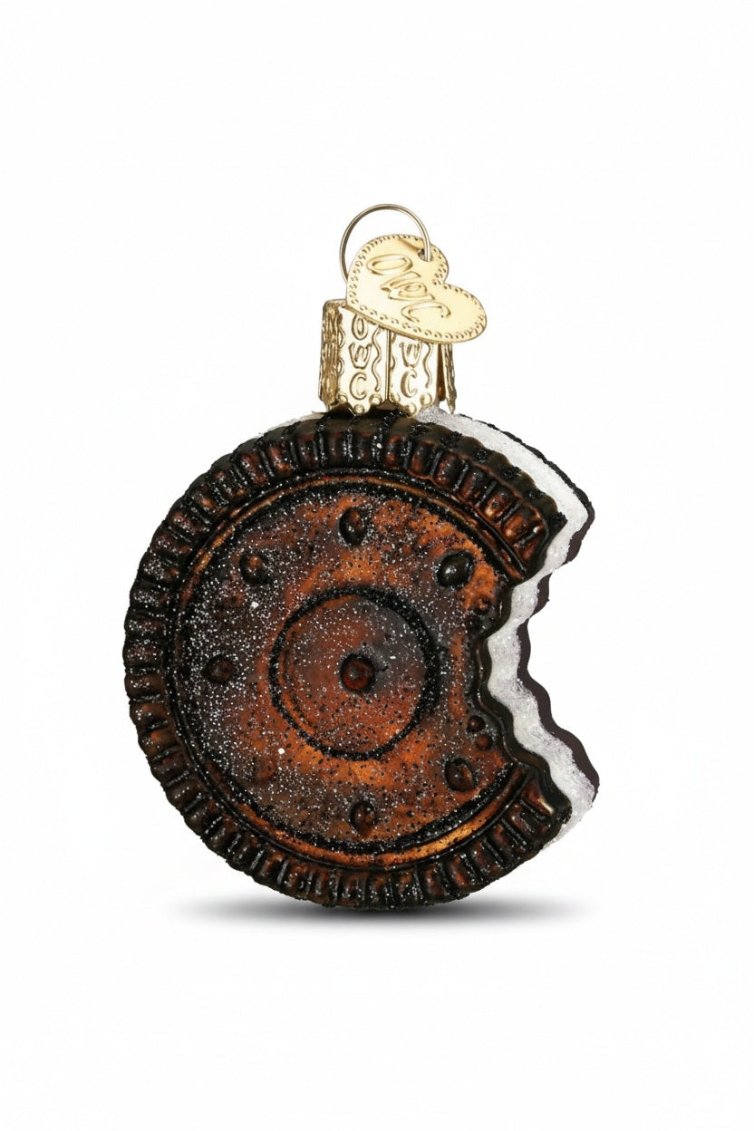 Old World Christmas SANDWICH COOKIE ORNAMENT shaped like a dark chocolate sandwich cookie with a creamy filling and a bite taken out of it.