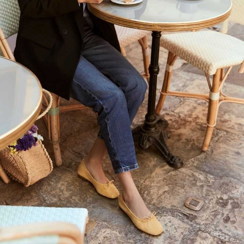 REQINS - HARMONY SUEDE BALLERINA FLATS IN OCHRE: a pair of ochre suede ballet flats with a small bow detail at the toes.