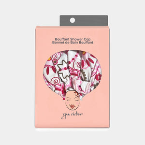 The BATH ACCESSORIES COMPANY BOUFFANT SHOWER CAP - BELLEZA features an elastic band and a pink, brown, and red floral pattern on a white background.