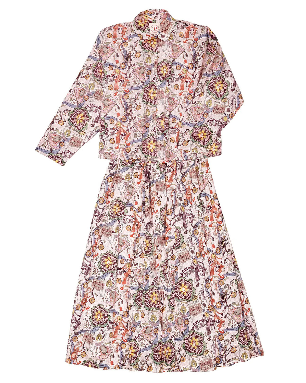 The Lulu Skirt by THE LITTLE PROJECT features a vibrant Liberty of London Cirque print with animals and floral designs in orange, purple, green, and yellow on an off-white base. Its elastic waist offers comfort and style.