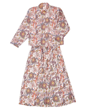 The Lulu Skirt by THE LITTLE PROJECT features a vibrant Liberty of London Cirque print with animals and floral designs in orange, purple, green, and yellow on an off-white base. Its elastic waist offers comfort and style.