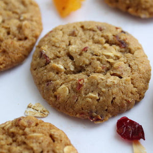 A packaged cookie labeled "WOW Baking - Gluten Free Oregon Oatmeal Cookie" from the WOW Baking Company. The packaging highlights that these bite-size cookies are wheat and gluten-free, made with natural ingredients, GMO-free, and certified gluten-free. The package weighs 2.75 oz (78g).