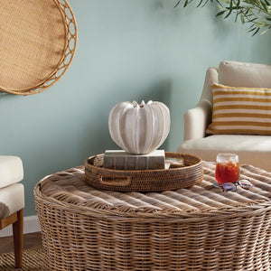 The NAPA HOME AND GARDEN - BLECKLYN POT is a white, glossy ceramic piece with a pumpkin-like form and pleated segments, featuring an artisan touch. Its uneven, scalloped opening evokes the essence of curated coastal-inspired design.