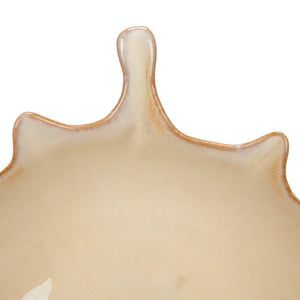 The CREATIVE COOP STONEWARE SUNBURST BOWL features wavy, irregular edges and a striking sunburst design in light neutral tones, shown here as two bowls—one viewed from the side, one from above.