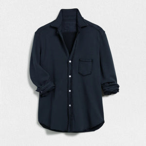 The FRANK & EILEEN Eileen Relaxed Button Up in Triple Fleece British Royal Navy showcases bust-flattering button placement, long rolled-up sleeves, and a chest pocket. Set against a light textured background, it offers classic style and ultimate comfort.