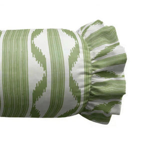 The LOOM & CLOTH - Ikat Stripe Ruffled Bolster Pillow in Green is a cylindrical bolster pillow with green and white wavy stripes, crafted with a 100% cotton cover and finished with ruffled ends, shown against a plain white background.