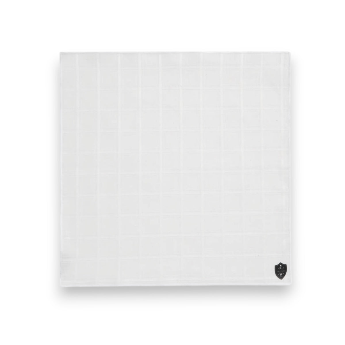The CLIFTON WILSON - WHITE LINEN WINDOWPANE POCKET SQUARE features a subtle check pattern and a small black logo in one corner, shown neatly folded on a white background.