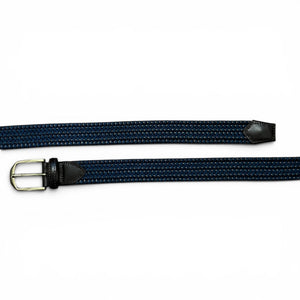 A person wearing a black shirt and grey pants with the ATHISON Braided Leather and Wool Stretch Belt in dark brown and blue.
