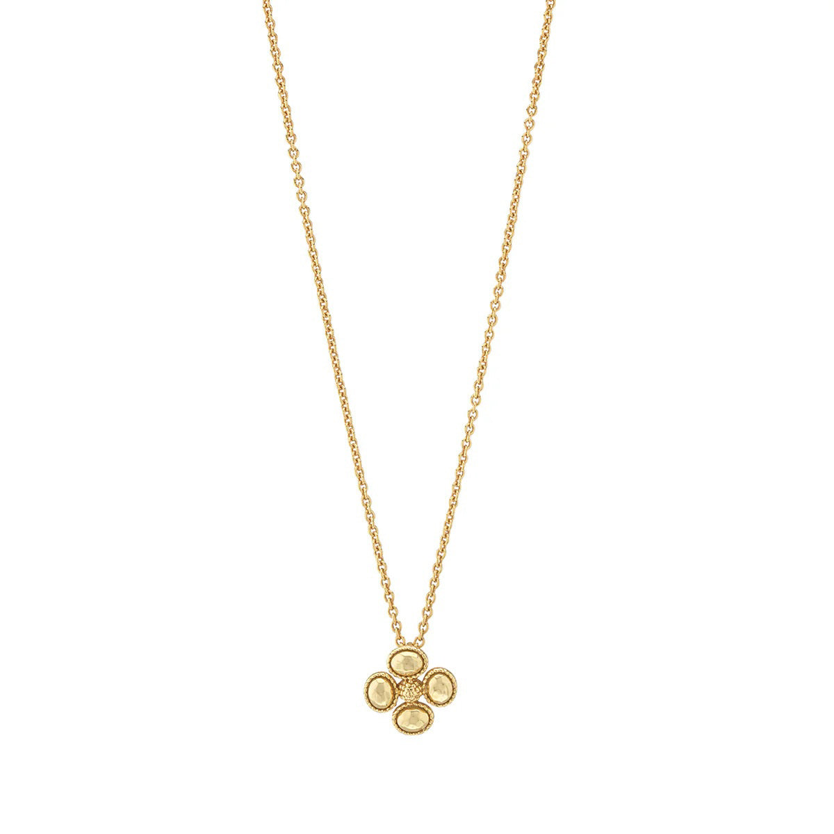 The CAPUCINE DE WULF - BERRY CLOVER STATION NECKLACE features a delicate 18K gold chain with handmade berry clover pendants, each displaying four round gold circles in a charming clover-like design.