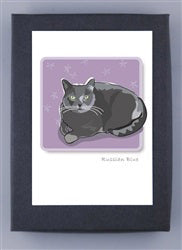 Here is an illustration from the PAPER RUSSELLS - RUSSIAN CAT NOTE CARDS by PAPER RUSSELLS. It shows a Russian Blue cat with gray fur and green eyes, lying down on a purple background with small flower patterns. The label &quot;Russian Blue&quot; is written beneath the cat. The image, printed on recycled paper, features a white border and is framed in gray.