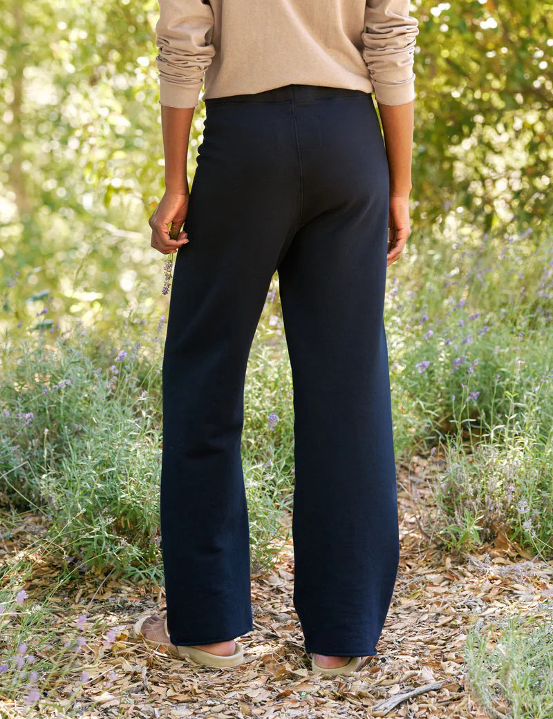 FRANK &amp; EILEEN&#39;s CATHERINE 29&quot; Full Length Sweatpant in British Royal Navy features a high-rise, wide-leg silhouette, elastic waistband with drawstring, and garment-dyed finish for a rich look. Shown flat on a white background.