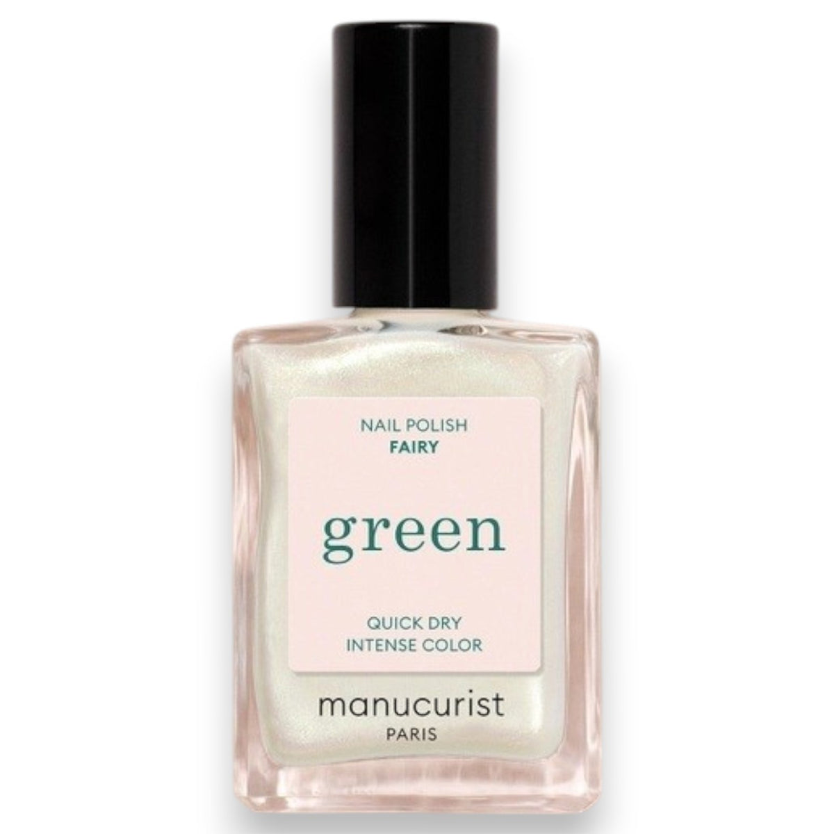 A person with light green painted nails holds a bottle of MANUCURIST INC’s GREEN™ Nail Polish in Fairy, wearing a purple knit top adorned with rhinestone embellishments.