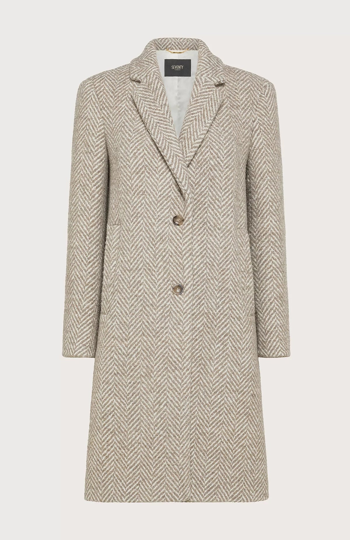 A sophisticated, single-breasted coat designed in a macro herringbone pattern on a white background. This SEVENTY coat, known as the SEVENTY - SINGLE BREASTED LUREZ MACRO HERRINGBONE COAT, features a notched lapel collar, long sleeves, and two buttons for closure. It’s crafted in light grey and white hues and proudly made in Italy with a label inside the collar that reads &quot;Sustain.