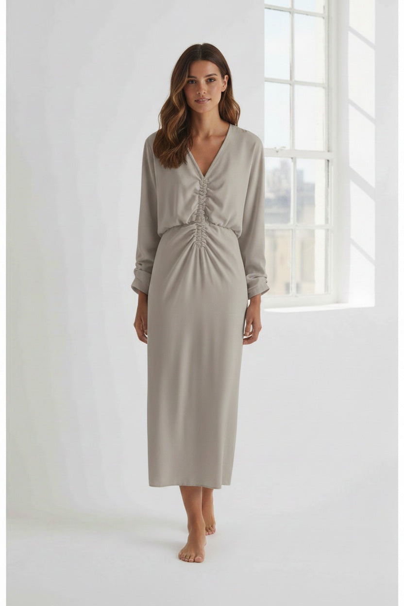 A person in dark sunglasses, black chunky shoes, and the MEIMEIJ Gathered Waist Long Sleeve Dress stands against a plain white background.