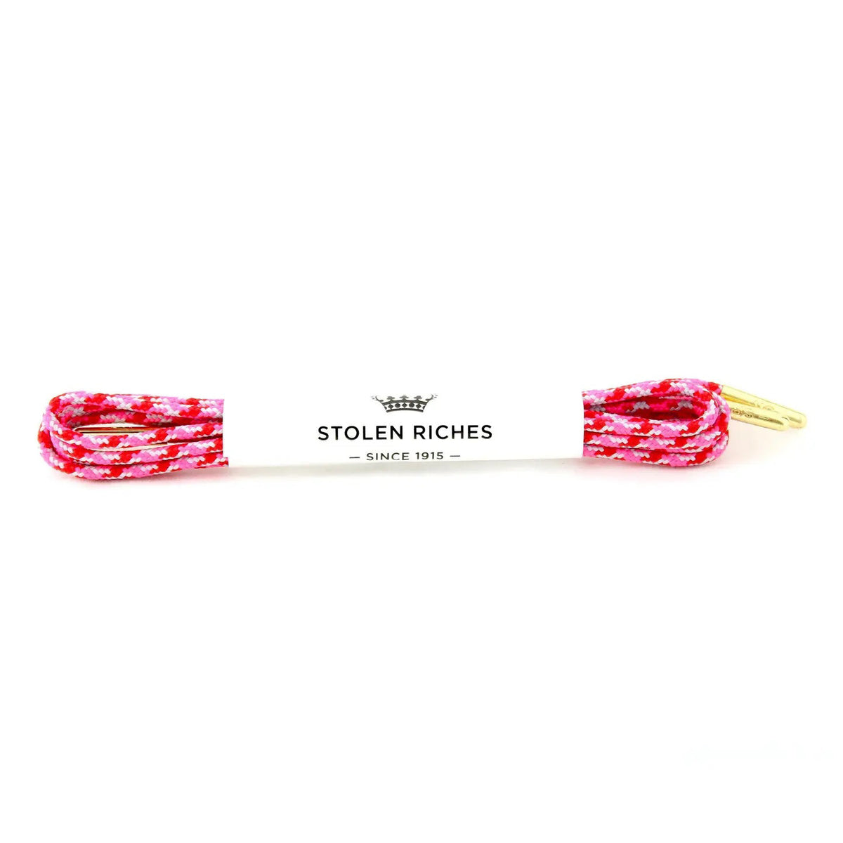 STOLEN RICHES - DRESS SHOELACES IN CAMO PINK: Premium pink and white camo-patterned laces with gold tips, bundled and wrapped in a white label reading “Stolen Riches Since 1915” with a crown logo.
