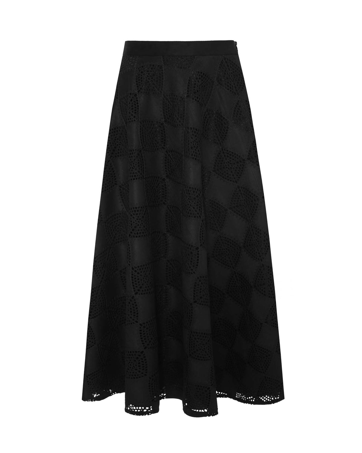 The SFIZIO - PATCHWORK CROCHET SUEDE CIRCLE SKIRT by SFIZIO is a black A-line midi skirt that features a checkered pattern with alternating solid and crochet knit squares, offering a modern look. The hemline falls slightly below the knee, adding an elegant touch to this patchwork design. Made in Italy.