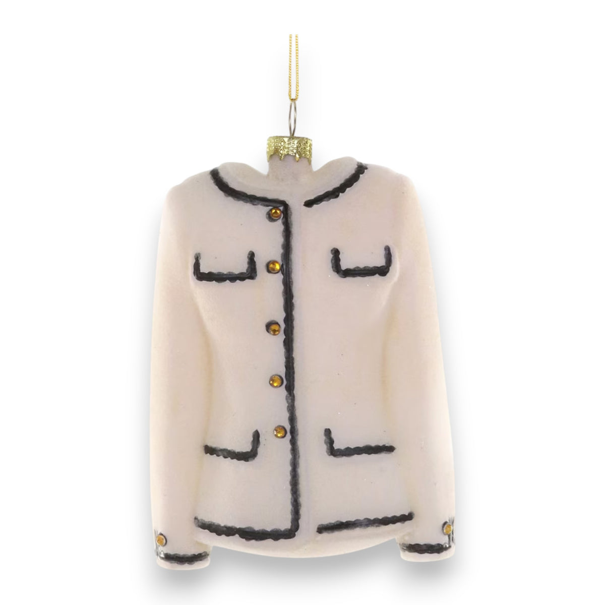 The LUXE TWEED JACKET ORNAMENT by CODY FOSTER is a 4.25-inch glass Christmas ornament shaped like a cream jacket with black trim and gold buttons, hanging from a gold string against a white background.