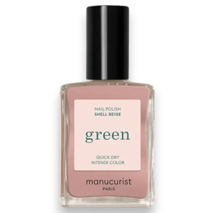 A bottle of MANUCURIST INC’s GREEN™ Nail Polish in Shell Beige, presented in a square glass bottle with a black cap and a white label displaying green and beige text. This non-toxic pinky beige polish combines elegant color with a clean, vegan formula.