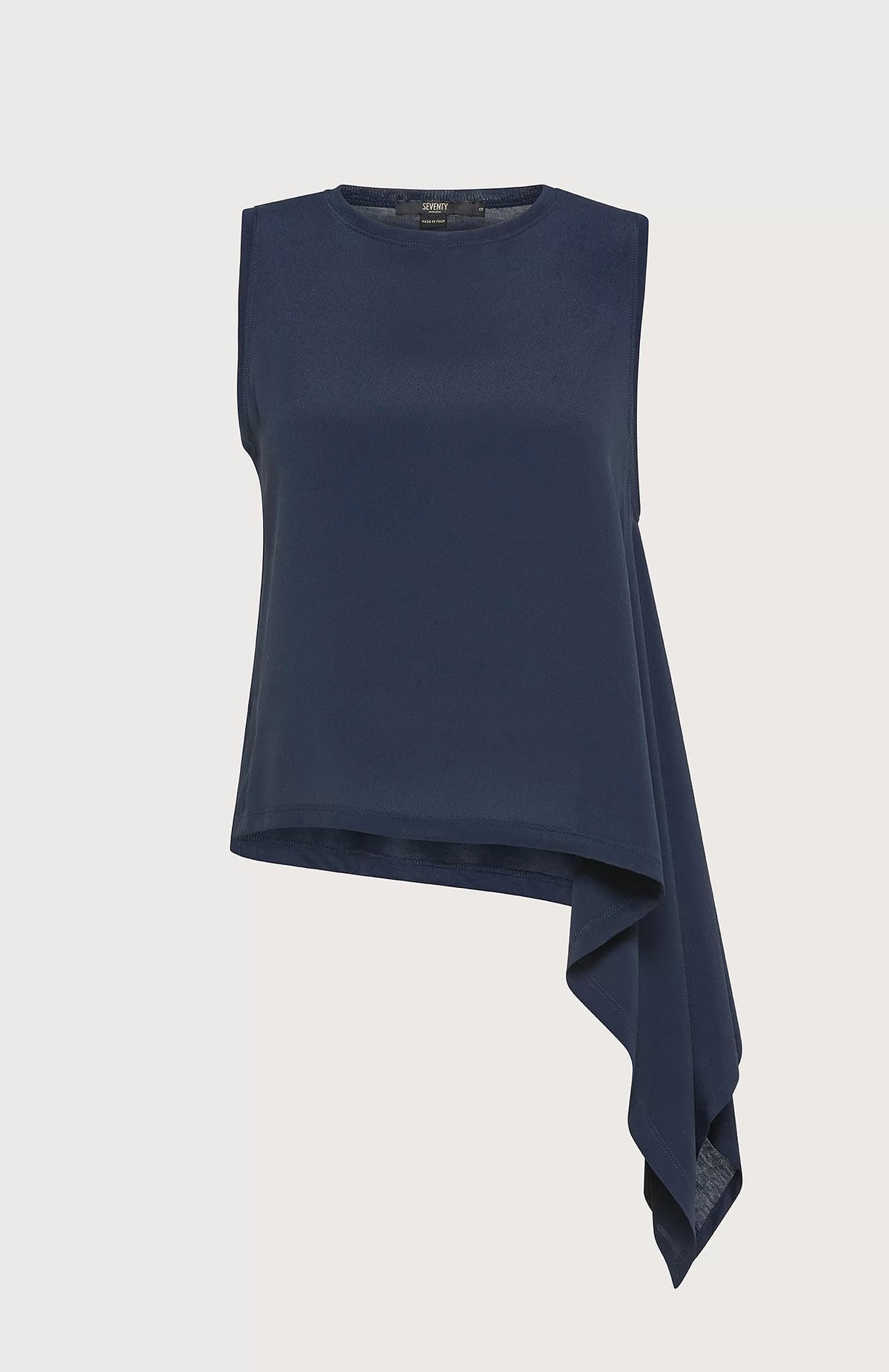 The SEVENTY VENEZIA sleeveless asymmetrical crew-neck top by SEVENTY is crafted from a lightweight silk-blend fabric with a jersey back. This dark navy blue blouse features an elegant, flowing design on the left side, creating a sophisticated look with its smooth texture and subtle sheen.