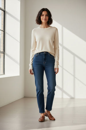The SEVENTY VENEZIA - Crew Neck Cotton and Modal Top in Ivory by SEVENTY is showcased against a light background, featuring a simple front view with no visible patterns, logos, or embellishments. Made from a soft cotton-modal blend, this long-sleeve top combines comfort with timeless, understated style.