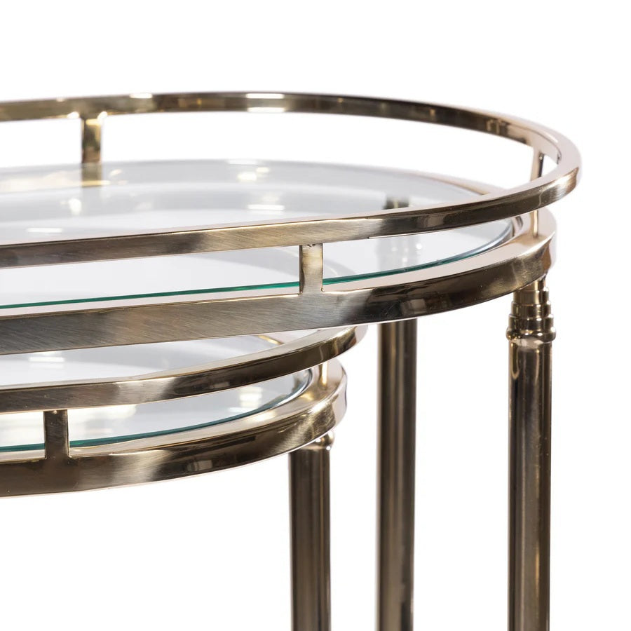 The SPIGA GOLD BAR CART by ZODAX features a vintage Italian-inspired design with elegant gold framing, mirrored glass shelves on both tiers, and smooth-rolling four-wheel mobility. Displayed against a white background, this piece is both stylish and functional.