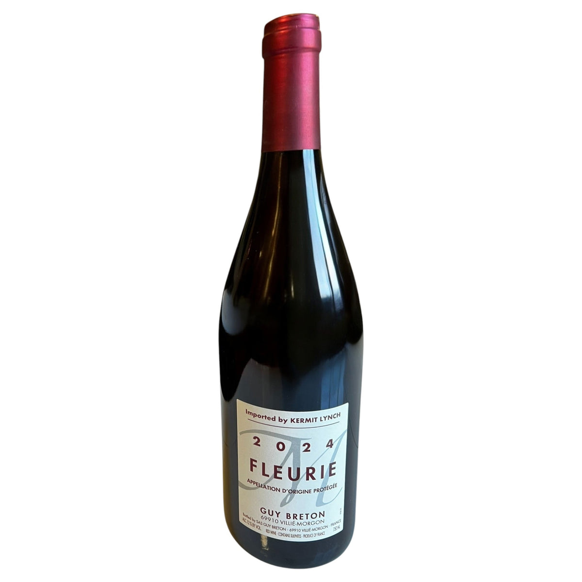 A bottle of GUY BRETON FLEURIE BEAUJOLAIS 2024 by WINE: TRYON, featuring a red foil top and white label with "Imported by Kermit Lynch," is shown against a white background.