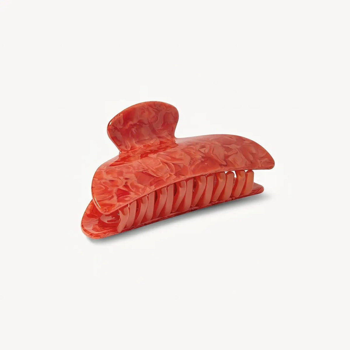 The MACHETE - MIDI HAIRLOOM CLAW IN POPPY by MACHETE is a large orange marbled Italian acetate hair claw with wide teeth, shown against a plain white background.