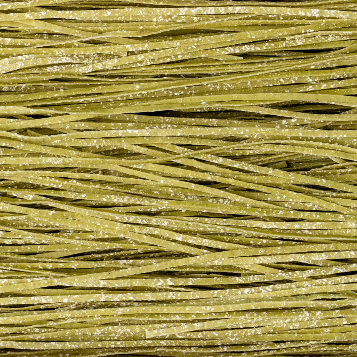 A teal box of CIPRIANI FOOD Organic Tagliolini Egg Pasta with Spinach, made from premium durum wheat semolina, displays the pasta through a window and features Italian flags plus product info in both Italian and English.