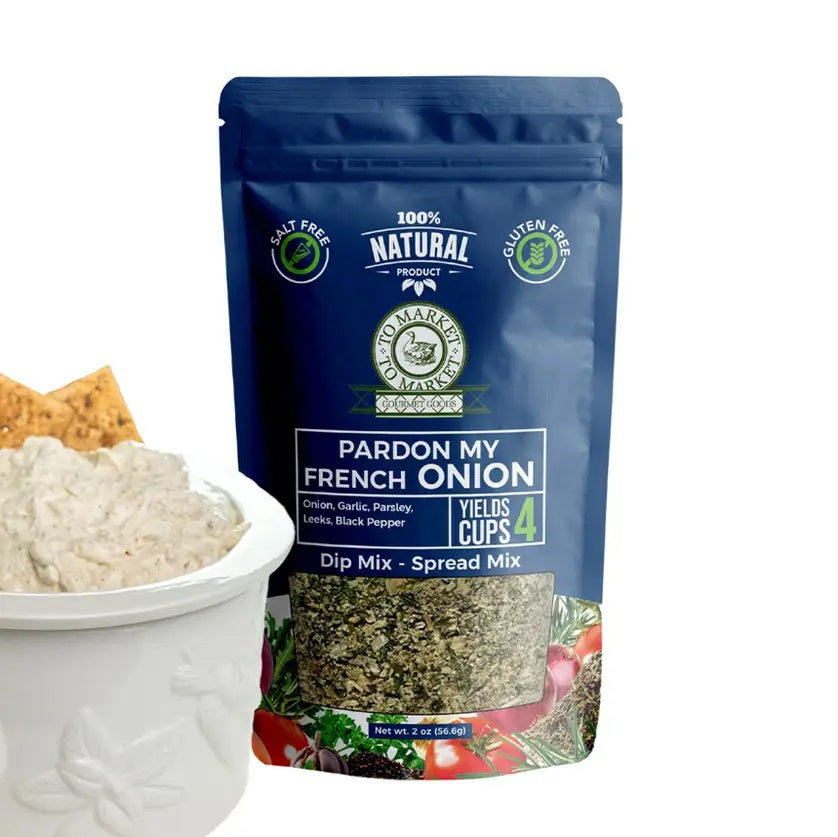 A blue pouch labeled “TO MARKET - PARDON MY FRENCH ONION DIP MIX” from TO MARKET- DIPS & SPREADS sits next to a white bowl of dip with crackers. The package highlights that it is all-natural, salt-free, gluten free, and yields 4 cups—making it the perfect choice for anyone craving a classic French onion dip or a flavorful soup mix.