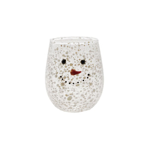 The CREATIVE COOP CONFETTI DRINKING GLASS WITH SNOWMAN FACE is a clear, stemless glass with a textured, bubbly surface and a cheerful snowman face featuring black dot eyes and mouth plus an orange-red curved nose.