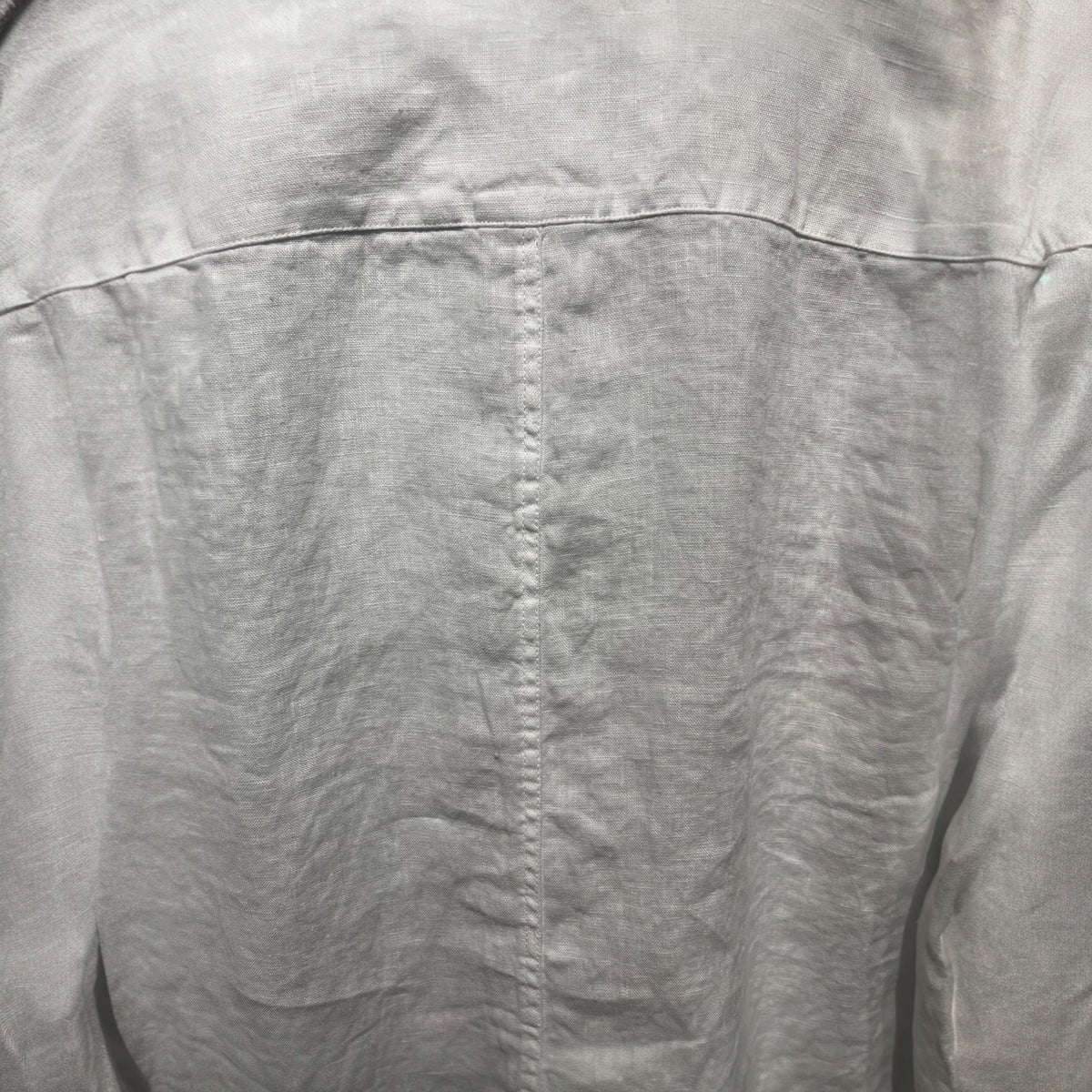 The FRANK & EILEEN Finbar Men's Button Up Shirt in White Washed Linen is shown with casually rolled long sleeves and a relaxed, slightly wrinkled look against a plain white background.