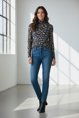 The FRANCO FERRARI - BALLET MESH TURTLENECK is a fitted, sheer mesh top with an abstract monochrome print of scattered light brushstroke spots, shown against a white background.