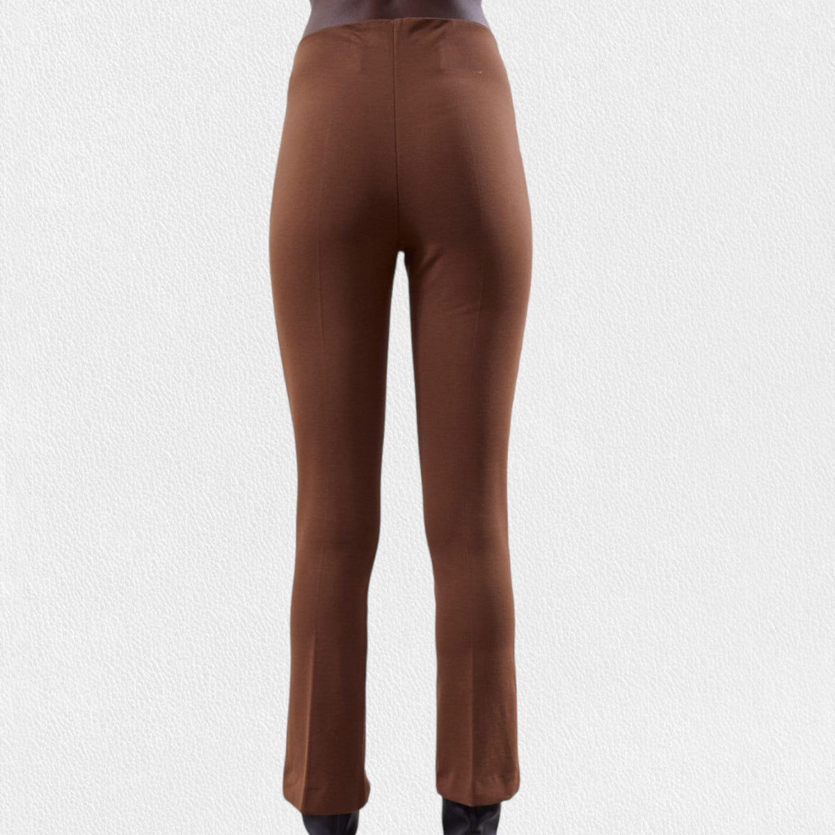 The MEIMEIJ - CROPPED STRETCH FRONT SLIT PANT is a pair of dark navy blue, high-waisted, straight-leg pull-on pants with a tailored fit and smooth finish, featuring front slit hems. Displayed against a light grey textured background, these MADE IN ITALY pants exude elegance and style.