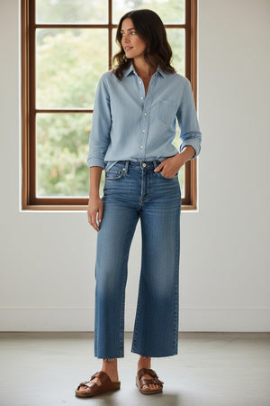 The FRANK & EILEEN Galway Gaucho Jean in 1972 Wash features a light blue, high-waisted wide-leg style in Italian Dream Denim with a faded wash and raw hem, shown flat on a white textured background.
