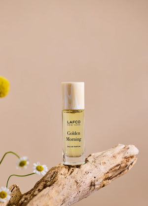 Housed in a clear glass bottle with a beige cap and minimalist black labeling, LAFCO Fine Fragrance Golden Morning 10ml is a floral perfume delicately crafted with essential oils for a fresh, uplifting scent.