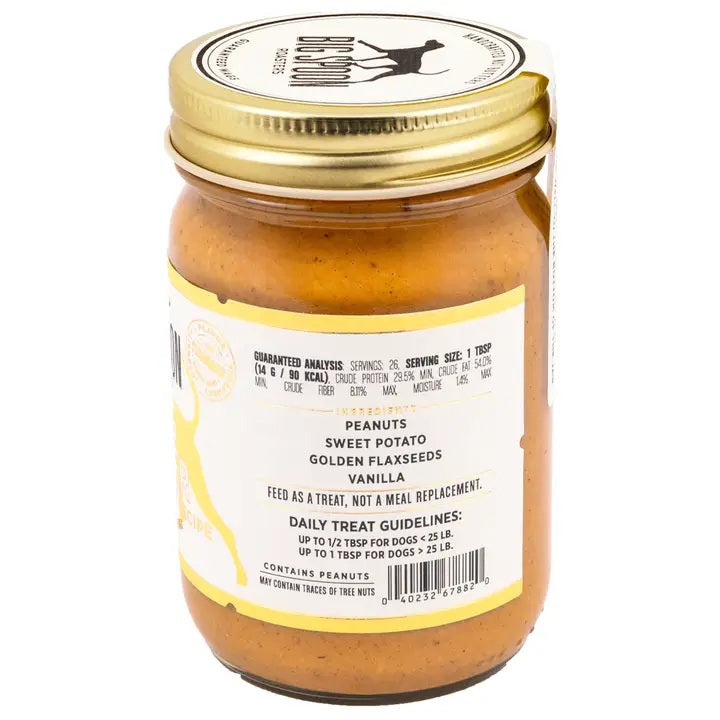 BIG SPOON ROASTERS WAG BUTTER VANILLA TATER is a handmade nut and peanut butter for dogs, with a gold lid and white label with yellow accents and a dog silhouette—an irresistible treat from BIG SPOON ROASTERS.