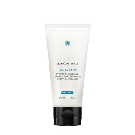 A white 50 ml tube of SKINCEUTICALS - HYDRA BALM by SkinCeuticals with a blue and black label. The text reads &quot;Hydrating occlusive ointment for traumatized or severely dry skin.&quot; This moisturizing balm is labeled for intensive hydration and skin barrier support.