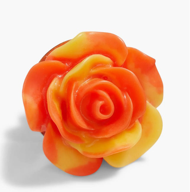 The CLIFTON WILSON - RESIN LAPEL FLOWER PIN is a detailed yellow rose accessory with smooth petals, evoking elegance and charm—a unique formalwear accent—presented against a plain white background.
