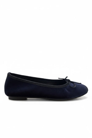 REQINS - HARMONY VELEVET BALLET FLATS IN NUIT, a dark blue velvet ballet flat featuring a small decorative bow at the toe and black trim for a classic feminine aesthetic.