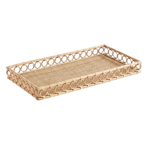 The NAPA HOME AND GARDEN Ninette Rectangular Rattan Tray, Large, features raised sides and a decorative open circle edge in natural beige—ideal for bringing boho coastal charm to your home decor.