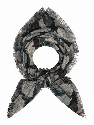 The FRANCO FERRARI - GRIDO REVERSIBLE WOOL SCARF 68X68 features a square shape, with blue, white, and mauve floral patterns on black, fringed edges, and detailed flowers and leaves at the corners and borders.
