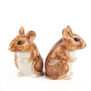 The QUAIL CERAMICS Wood Mouse Salt and Pepper Set by QUAIL DESIGNS features two hand-painted brown and white stoneware mice figurines with large ears, black eyes, and tiny paws, standing upright side by side.