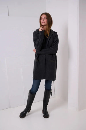 The HENRIETTA STEFFENSEN - FLEECE HOODED CARDIGAN by HENRIETTE STEFFENSED is a black, knee-length, open-front coat with long sleeves and no visible buttons or zippers, crafted from recycled polyester and shown on a plain white background.