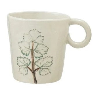 The HAND-PAINTED STONEWARE MUG WITH BOTANICAL DESIGN by CREATIVE COOP features a cream finish, round handle, and three vertical blue and purple lavender sprigs hand-painted on the side.