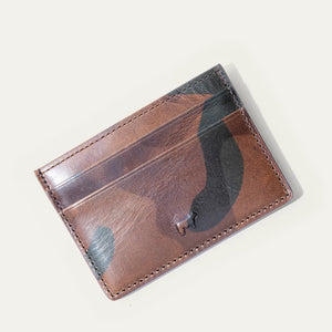 Two WILL LEATHER GOODS Military Pocket Card Cases in military green are shown on a light background: one features RFID-blocking protection with a transparent ID slot, while the other displays card slots and an embossed animal logo.