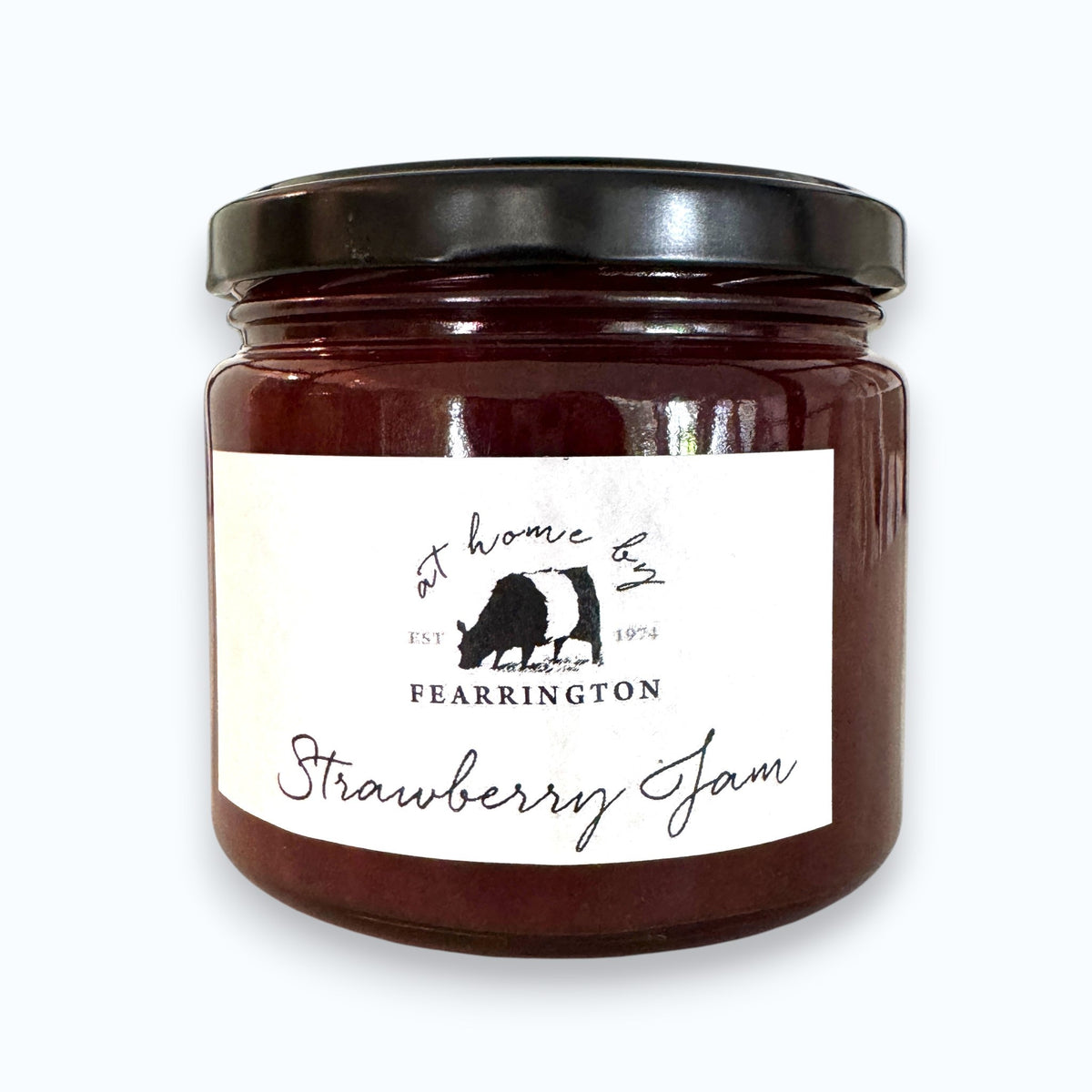 Introducing the FEARRINGTON HOUSEMADE STRAWBERRY JAM from the FEARRINGTON SIGNATURE COLLECTION, this jar of delicious strawberry jam is adorned with a charming black and white striped ribbon tied around the lid. Perfect as a hostess gift, its label lists wholesome ingredients such as strawberry, vanilla, lemon, pectin, and sugar. This handmade treat may contain allergens and is a delightful choice for breakfast jam enthusiasts.