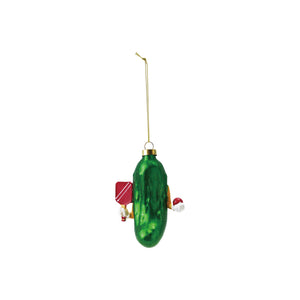 The CREATIVE COOP PICKLEBALL ORNAMENT is a green mercury glass pickleball-shaped Christmas decoration with a gold cap and hanging string, adorned with small red and white festive accents, shown on a white background.