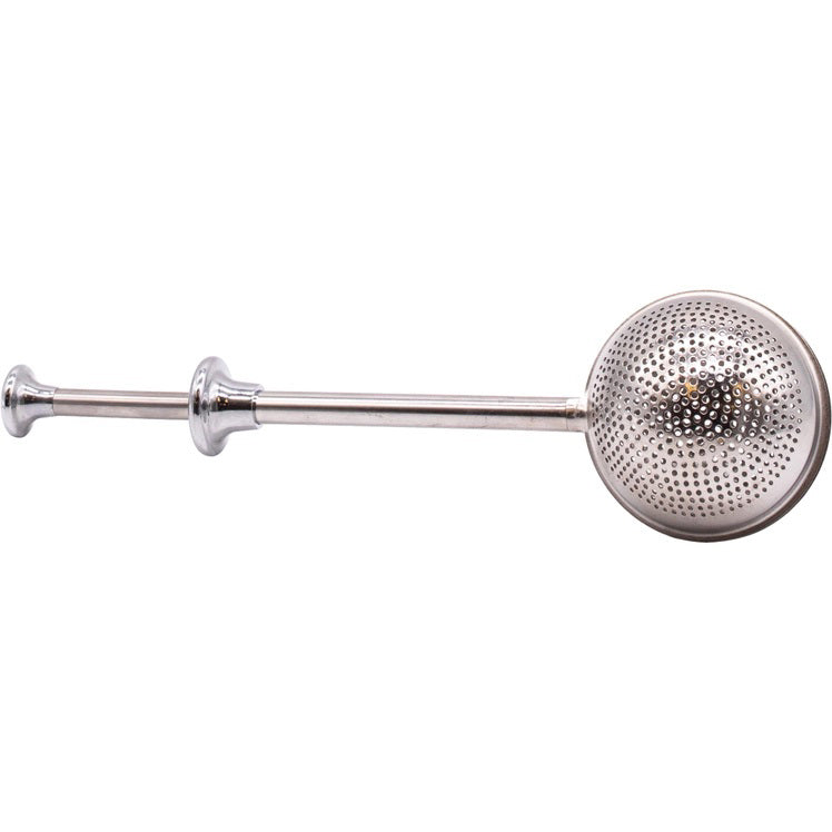 The STEEPER by THE CHAI BOX is a stainless steel, sphere-shaped infuser with fine perforations and a long handle—ideal for brewing loose leaf teas or infusing spices and fruits into your drinks.